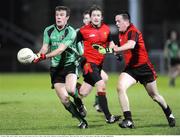 22 January 2009; James Loughrey, Queens, in action against Conor Garvey, Down. Gaelic Life Dr. McKenna Cup Semi-Final, Queens v Down, Pairc Esler, Newry, Co. Down. Picture credit: Oliver McVeigh / SPORTSFILE