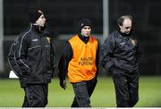 22 January 2009; Down joint managers Ross Carr, left, DJ Kane, right, and trainer Paddy Tally leave the field at half-time. Gaelic Life Dr. McKenna Cup Semi-Final, Queens v Down, Pairc Esler, Newry, Co. Down. Picture credit: Oliver McVeigh / SPORTSFILE
