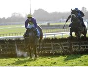 23 January 2009; Eventual winner Across The Bay, with Barry Geraghty up, right, clears the last behind eventual second place Qualviro, Tom Doyle up, during the Kehoe Ceilings & Partitions Maiden Hurdle. Fairyhouse Racecourse, Ratoath, Co. Meath. Picture credit: Brian Lawless / SPORTSFILE