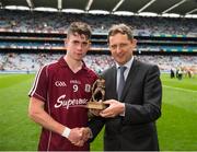16 August 2015; Pictured is Jim Dollard, Executive Director for Business Service Centre and Electric Ireland, proud sponsor of the GAA All-Ireland Minor Championships, presenting Jack Coyne, from Galway, with the Player of the Match award for his outstanding performance in the Electric Ireland GAA Minor Hurling Championship Semi-Final replay, Kilkenny vs Galway in Croke Park. Throughout the Championship fans can follow the action, support the Minors and be a part of something major through the hashtag #ThisIsMajor. Croke Park, Dublin. Picture credit: Ray McManus / SPORTSFILE