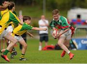 16 August 2015; Dylan Doyle of Hacketstown, Co. Carlow, in action during the Mixed U14 and O11 Tag Rugby. HSE National Community Games Festival, Weekend 1. Athlone IT, Athlone, Co. Westmeath. Picture credit: Seb Daly / SPORTSFILE