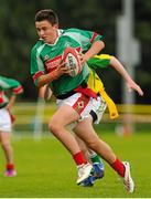 16 August 2015; Cormac Connolly, Hacketstown, Co. Carlow, in action during the Mixed U14 and O11 Tag Rugby. HSE National Community Games Festival, Weekend 1. Athlone IT, Athlone, Co. Westmeath. Picture credit: Seb Daly / SPORTSFILE