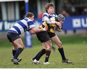 24 January 2009; Cian Clohessy, Young Munster, is tackled by Zack Farivarz, left, and Kyle Tonetti, Blackrock. AIB League Division 1, Blackrock v Young Munster, Stradbrook Road, Blackrock, Dublin. Photo by Sportsfile