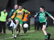 24 January 2009; David Walsh, Donegal, in action against Aidan McCrory, Queens. Gaelic Life Dr. McKenna Cup Final, Donegal v Queens. Healy Park, Omagh, Co. Tyrone. Picture credit: Oliver McVeigh / SPORTSFILE