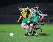 24 January 2009; Brendan Boyle, Donegal, in action against Brendan McArdle, Queens. Gaelic Life Dr. McKenna Cup Final, Donegal v Queens. Healy Park, Omagh, Co. Tyrone. Picture credit: Oliver McVeigh / SPORTSFILE