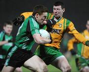 24 January 2009; Charlie Vernon, Queens, in action against Ciaran Bonner, Donegal. Gaelic Life Dr. McKenna Cup Final, Donegal v Queens. Healy Park, Omagh, Co. Tyrone. Picture credit: Oliver McVeigh / SPORTSFILE