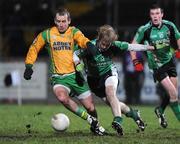 24 January 2009; Barry Monaghan, Donegal, in action against Shaun O'Neill, Queens. Gaelic Life Dr. McKenna Cup Final, Donegal v Queens. Healy Park, Omagh, Co. Tyrone. Picture credit: Oliver McVeigh / SPORTSFILE