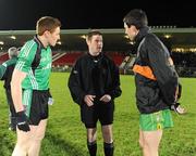 24 January 2009; Referee Padraig Hughes chats to  Queens captain Charlie Vernon, left, and Donegal captain Rory Kavanagh before the toss. Gaelic Life Dr. McKenna Cup Final, Donegal v Queens. Healy Park, Omagh, Co. Tyrone. Picture credit: Oliver McVeigh / SPORTSFILE