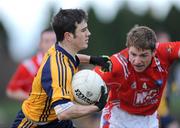 25 January 2009; Martin McElroy, DCU, in action against Benny McArdle, Louth. O'Byrne Cup Final, Louth v DCU, O'Raghallaighs GAA Ground, Drogheda, Co. Louth. Photo by Sportsfile