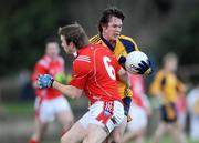 25 January 2009; David Keenan, DCU, in action against Michael Fanning, Louth. O'Byrne Cup Final, Louth v DCU, O'Raghallaighs GAA Ground, Drogheda, Co. Louth. Photo by Sportsfile