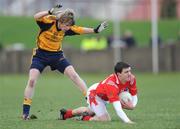25 January 2009; Adrian Reid, Louth, in action against Barry Watters, DCU. O'Byrne Cup Final, Louth v DCU, O'Raghallaighs GAA Ground, Drogheda, Co. Louth. Photo by Sportsfile