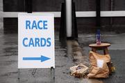 25 January 2009; A race card sellers position sits abandoned during a heavy shower. Leopardstown Racecourse, Leopardstown, Co. Dublin. Picture credit: Brian Lawless / SPORTSFILE