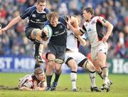 25 January 2009; Rocky Elsom, Leinster, is tackled by Andrew Turnbell, right, Jim Thompson, and Nick De Luca, far right, Edinburgh. Heineken Cup, Pool 2, Round 6, Leinster v Edinburgh, RDS, Dublin. Picture credit: David Maher / SPORTSFILE