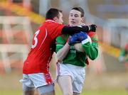 25 January 2009; Mark Griffin, St Michael's/Foilmore, is tackled by Shane Gormley, Trillick. AIB GAA Football All-Ireland Intermediate Club Championship Semi-Final, St Michael's/Foilmore, Kerry, v Trillick, Tyrone. O'Moore Park, Portlaoise, Co. Laois. Picture credit: Stephen McCarthy / SPORTSFILE