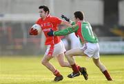 25 January 2009; Proinsias O'Kane, Trillick, in action against David King, St Michael's/Foilmore. AIB GAA Football All-Ireland Intermediate Club Championship Semi-Final, St Michael's/Foilmore, Kerry, v Trillick, Tyrone. O'Moore Park, Portlaoise, Co. Laois. Picture credit: Stephen McCarthy / SPORTSFILE