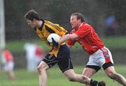 25 January 2009; Kevin Reilly, DCU, in action against J.P. Rooney, Louth. O'Byrne Cup Final, Louth v DCU, O'Raghallaighs GAA Ground, Drogheda, Co. Louth. Photo by Sportsfile
