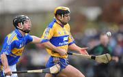 25 January 2009; Tony Griffin, Clare, in action against Conor O'Mahony, Tipperary. Waterford Crystal Cup Hurling Final, Clare v Tipperary, Ogonnolloe, Co. Clare. Picture credit: Pat Murphy / SPORTSFILE