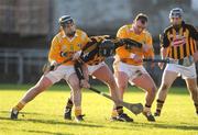 25 January 2009; Jackie Tyrrell, Kilkenny, in action against Paddy Doherty and Kieran Kelly, Antrim. Walsh Cup Semi-Final, Antrim v Kilkenny, Casement Park, Belfast, Co. Antrim. Picture credit: Oliver McVeigh / SPORTSFILE