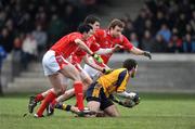 25 January 2009; Dermot Sheridan, DCU, in action against Brian White, left, Adrian reid and Michael Fanning, right, Louth. O'Byrne Cup Final, Louth v DCU, O'Raghallaighs GAA Ground, Drogheda, Co. Louth. Photo by Sportsfile