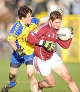 25 January 2009; Gary O'Donnell, Galway, in action against Fintan Cregg, Roscommon. FBD League Final, Galway v Roscommon, Tuam Stadium, Tuam, Co. Galway. Picture credit: Ray Ryan / SPORTSFILE