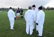 25 January 2009; The umpires before the start of the game as referee John Bannon has his picture taken with the team captains. O'Byrne Cup Final, Louth v DCU, O'Raghallaighs GAA Ground, Drogheda, Co. Louth. Photo by Sportsfile