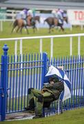 25 January 2009; A race steward endures the harsh weather conditions during the Synergy Security Services Novice Hurdle. Leopardstown Racecourse, Leopardstown, Co. Dublin. Picture credit: Brian Lawless / SPORTSFILE