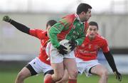 25 January 2009; James O'Shea, St Michael's/Foilmore, in action against Fearghal Donnelly, left, and Kevin McCaughey, Trillick. AIB GAA Football All-Ireland Intermediate Club Championship Semi-Final, St Michael's/Foilmore, Kerry, v Trillick, Tyrone. O'Moore Park, Portlaoise, Co. Laois. Picture credit: Stephen McCarthy / SPORTSFILE
