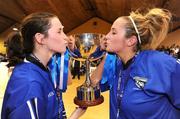 25 January 2009; Sisters Niamh, left, and Grainne Dwyer of Team Montenotte Hotel, Glanmire, celebrate with the cup after the game. Women's Superleague Cup Final, Bausch & Lomb Wildcats, Waterford, v Team Montenotte Hotel, Glanmire, Cork, National Basketball Arena, Tallaght. Picture credit: Brendan Moran / SPORTSFILE