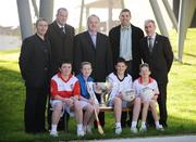 26 January 2009; At the launch of Allianz GAA Football Leagues 2009, front from left, students Cillian McAuley, from Holy Trinity NS, Donaghmede, Dublin, Aoife O'Reilly, from St Brigid's, NS, Killester, Dublin Vincent Healy and Jonathan O'Keeffe, both from Holy Trinity NS, Donaghmede, Dublin, with back, from left, Damien Cassidy, Derry manager, Pat Gilroy, Dublin manager, Brendan Murphy, Chief Executive, Allianz Ireland, Kevin Walsh, Sligo manager and Mickey Harte, Tyrone manager. Allianz Headquarters, Elmpark, Merrion Rd, Dublin. Picture credit: Brendan Moran / SPORTSFILE