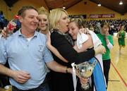 27 January 2009; Holy Family Newbridge captain Chloe McGuirk celebrates with her parents Pat and Geraldine McGuirk at the end of the game. Girls U16 C Final, Methodist College, Belfast, Co. Antrim v Holy Family Newbridge, Co. Kildare, National Basketball Arena, Tallaght, Co. Dublin. Photo by Sportsfile
