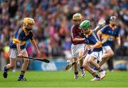 16 August 2015; Liam Doyle, Gaile NS, Holycross, Thurles, Tipperary, and James Corcoran, St. Colmcilles Templemore, Tipperary, in action against Leo Moloney, Annyalla NS, Castleblayney, Monaghan, representing Galway, during the Cumann na mBunscol INTO Respect Exhibition Go Games 2015 at Tipperary v Galway - GAA Hurling All-Ireland Senior Championship Semi-Final. Croke Park, Dublin. Picture credit: Ray McManus / SPORTSFILE