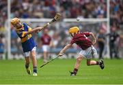 16 August 2015; Dara McGonigle, St. Canice’s PS, Dungiven, Derry, representing Tipperary, in action against Andrew Kelly, Ballintotas NS, Castlemartyr, Cork, representing Galway, during the Cumann na mBunscol INTO Respect Exhibition Go Games 2015 at Tipperary v Galway - GAA Hurling All-Ireland Senior Championship Semi-Final. Croke Park, Dublin. Picture credit: Ray McManus / SPORTSFILE