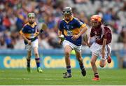 16 August 2015; Aidan Connor, Ballybrown NS, Clarina, Limerick, representing Tipperary, in action against Michael Morgan, Scoil Ursula, Sligo, representing Galway, during the Cumann na mBunscol INTO Respect Exhibition Go Games 2015 at Tipperary v Galway - GAA Hurling All-Ireland Senior Championship Semi-Final. Croke Park, Dublin. Picture credit: Stephen McCarthy / SPORTSFILE