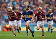 16 August 2015; Aidan Connor, Ballybrown NS, Clarina, Limerick, representing Tipperary, in action against Michael Morgan, Scoil Ursula, Sligo, representing Galway, during the Cumann na mBunscol INTO Respect Exhibition Go Games 2015 at Tipperary v Galway - GAA Hurling All-Ireland Senior Championship Semi-Final. Croke Park, Dublin. Picture credit: Stephen McCarthy / SPORTSFILE