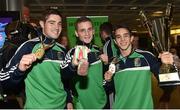 16 August 2015; Ireland's medal winners Joe Ward, gold medal 81kg light heavy weight, left, Dean Walsh, bronze medal welter weight, centre, and Michael Conlan, gold medal and Best Boxer award Bantam weight, at the Ireland team's homecoming from the EUBC Elite European Boxing Championships. Dublin Airport, Dublin. Picture credit: Cody Glenn / SPORTSFILE
