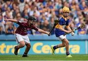 16 August 2015; Dara McGonigle, St. Canice’s PS, Dungiven, Derry, representing Tipperary, in action against Colm Sheehan, Laragh NS, Bandon, Cork, representing Galway, during the Cumann na mBunscol INTO Respect Exhibition Go Games 2015 at Tipperary v Galway - GAA Hurling All-Ireland Senior Championship Semi-Final. Croke Park, Dublin. Picture credit: Stephen McCarthy / SPORTSFILE