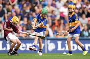 16 August 2015; Liam Doyle, Gaile NS, Holycross, Thurles, Tipperary, representing Tipperary, in action against Leo Moloney, Annyalla NS, Castleblayney, Monaghan, representing Galway, during the Cumann na mBunscol INTO Respect Exhibition Go Games 2015 at Tipperary v Galway - GAA Hurling All-Ireland Senior Championship Semi-Final. Croke Park, Dublin. Picture credit: Stephen McCarthy / SPORTSFILE