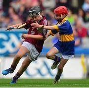 16 August 2015; Colin Kelly, from Sixmilebridge NS, Clare, representing Galway, in action against Niall Duggan, St Brigids Maghera, Derry, representing Tipperary, during the the Cumann na mBunscol INTO Respect Exhibition Go Games 2015 at Tipperary v Galway - GAA Hurling All-Ireland Senior Championship Semi-Final. Croke Park, Dublin. Picture credit: Piaras Ó Mídheach / SPORTSFILE