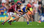 16 August 2015; Niall Duggan, St Brigids Maghera, Derry, representing Tipperary, in action against Pádraig O'Sullivan, Ardfert NS, Tralee, Kerry, during the Cumann na mBunscol INTO Respect Exhibition Go Games 2015 at Tipperary v Galway - GAA Hurling All-Ireland Senior Championship Semi-Final. Croke Park, Dublin. Picture credit: Piaras Ó Mídheach / SPORTSFILE