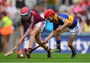16 August 2015; Pádraig O'Sullivan, Ardfert NS, Tralee, Kerry, representing Galway, in action against Niall Duggan, Sr Brigids Maghera, Derry, representing Tipperary, during the Cumann na mBunscol INTO Respect Exhibition Go Games 2015 at Tipperary v Galway - GAA Hurling All-Ireland Senior Championship Semi-Final. Croke Park, Dublin. Picture credit: Piaras Ó Mídheach / SPORTSFILE