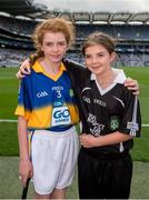 16 August 2015; Brid Magill, St Brigid’s PS, Cloughmills, Ballymena, Antrim, representing Tipperary, and her twin sister Bronagh, who was the referee, before the Cumann na mBunscol INTO Respect Exhibition Go Games 2015 at Tipperary v Galway - GAA Hurling All-Ireland Senior Championship Semi-Final. Croke Park, Dublin. Picture credit: Ray McManus / SPORTSFILE