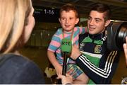16 August 2015; Ireland gold medal winner Joe Ward, 81kg light heavy weight, is interviewed by RTE with his son Joel Ward, age 3, at the Ireland team's homecoming from the EUBC Elite European Boxing Championships. Dublin Airport, Dublin. Picture credit: Cody Glenn / SPORTSFILE