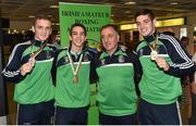 16 August 2015; Ireland's medal winners Dean Walsh, bronze medal welter weight, left, Michael Conlan, gold medal Bantam weight, centre left, and Joe Ward, gold medal 81kg light heavy weight, right, with technical coach Zauri Antia, at the Ireland team's homecoming from the EUBC Elite European Boxing Championships. Dublin Airport, Dublin. Picture credit: Cody Glenn / SPORTSFILE