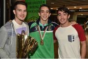16 August 2015; Ireland gold medal winner Michael Conlan, Bantam weight, centre, with his brothers Sean Paul Conlan, left, and Jamie Conlan, right, at the Ireland team's homecoming from the EUBC Elite European Boxing Championships. Dublin Airport, Dublin. Picture credit: Cody Glenn / SPORTSFILE