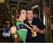 16 August 2015; Ireland gold medal winner Michael Conlan, Bantam weight, hoists his Best Boxer trophy alongside his father John Conlan at the Ireland team's homecoming from the EUBC Elite European Boxing Championships. Dublin Airport, Dublin. Picture credit: Cody Glenn / SPORTSFILE