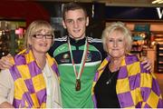 16 August 2015; Ireland's Dean Walsh, bronze medal winner welter weight, with his mother Cathleen Walsh, left, and grandmother Anne Morris, right, at the Ireland team's homecoming from the EUBC Elite European Boxing Championships. Dublin Airport, Dublin. Picture credit: Cody Glenn / SPORTSFILE