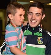 16 August 2015; Ireland's gold medal winner Joe Ward, 81kg light heavy weight, holds his son Joel, age 3, at the Ireland team's homecoming from the EUBC Elite European Boxing Championships. Dublin Airport, Dublin. Picture credit: Cody Glenn / SPORTSFILE