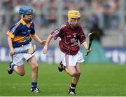 16 August 2015; Andrew Kelly, Ballintotas NS, Castlemartyr, Cork, representing Galway, in action against Tom Mathews, Scoil Bhríde, Dunleer, Louth, representing Tipperary, during the Cumann na mBunscol INTO Respect Exhibition Go Games 2015 at Tipperary v Galway - GAA Hurling All-Ireland Senior Championship Semi-Final. Croke Park, Dublin. Picture credit: David Maher / SPORTSFILE