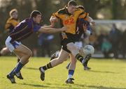 28 January 2009; Paul Cashen, NUI Maynooth, in action against Michael Moloney, left, and Colin O'Mhony, right, University of Limerick. Ulster Bank Sigerson Cup Round 1, NUI Maynooth v University of Limerick, Maynooth, Co. Kildare. Picture credit: Pat Murphy / SPORTSFILE