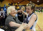 27 January 2009; Holy Family Newbridge captain Chloe McGuirk celebrates with her grandmother Nancy McGuirk at the end of the game. Girls U16 C Final, Methodist College, Belfast, Co. Antrim v Holy Family Newbridge, Co. Kildare, National Basketball Arena, Tallaght, Co. Dublin. Photo by Sportsfile
